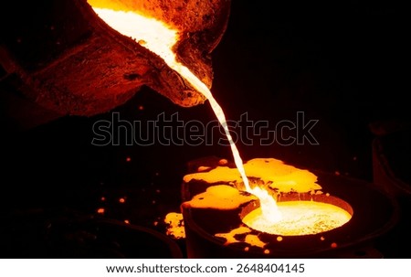 Foundry Worker Operating Hot Metal Pouring Process