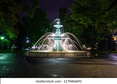 The fountain and the Europe park at night. - Powered by Shutterstock