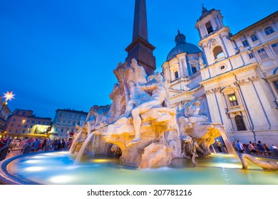 Fountain Of The Four Rivers And SantAgnese In Agone On Navona Square In Rome, Italy, Europe Shot At Dusk.