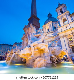 Fountain Of The Four Rivers And SantAgnese In Agone On Navona Square In Rome, Italy, Europe Shot At Dusk.