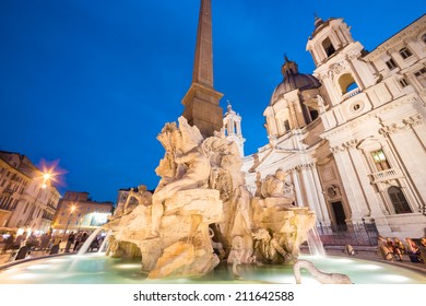 Fountain Of The Four Rivers And SantAgnese In Agone On Navona Square In Rome, Italy, Europe Shot At Dusk.