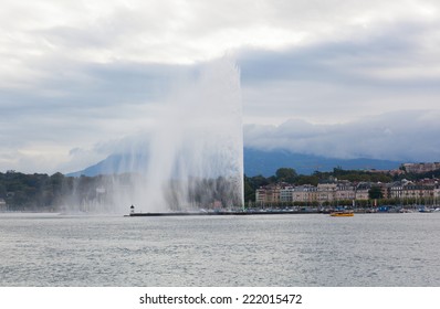 A fountain Jet dEau rises over the waterfront of Lake Geneva, Geneva, Switzerland