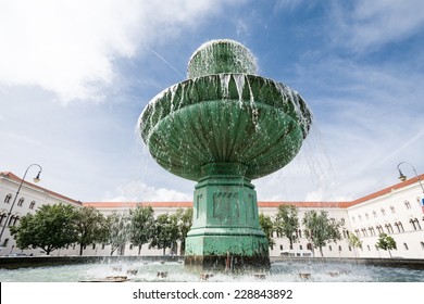 Fountain At The Ludwig Maximilian University Of Munich.