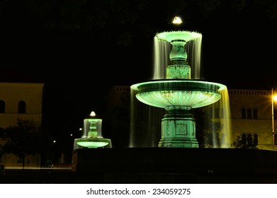 Fountain In Munich Front Of University Night