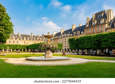 Fountain on Vosges square (Place des Vosges), Paris, France