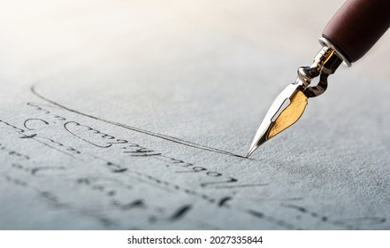Fountain pen on an antique handwritten letter. Vintage nib pen and handwritten english cursive style font copperplate, spencerian. Old history background. Retro style. - Shutterstock ID 2027335844