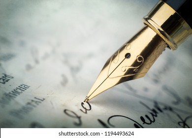 Fountain pen on an vintage handwritten letter. Old history background. Retro style.