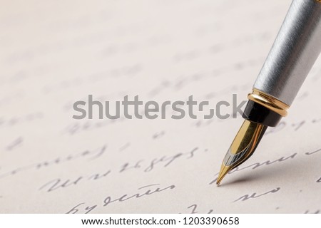 Fountain Pen on Written Page