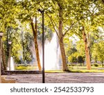 Fountain releasing water in a Bom Fim square, city of Setúbal, Portugal