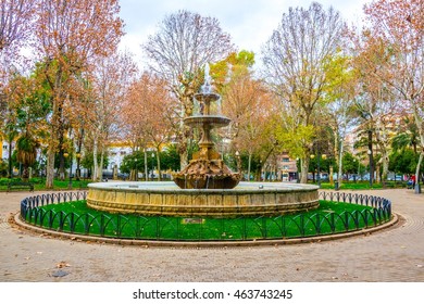 Fountain Situated On The Plaza De Colon Square Inside Of The Jardines De La Merced Gardens In The Spanish City Cordoba