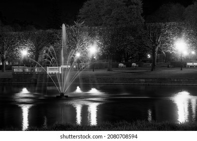 A fountain sprays the water of the Swan Lake in the Kadriorg park at Tallinn, Estonia on a quiet night.