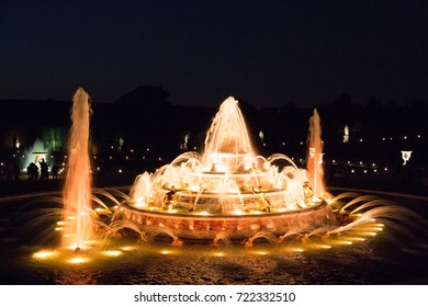 Fountain Of Versailles Palace In Paris At Night