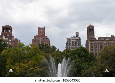 Fountain At Washington Square Park With Skyscrapers During Fall In Greenwich Village Of New York City