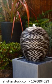 Fountain Water Feature In A Garden Yard With Running Water