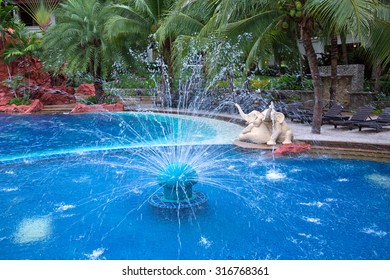 Fountain water in swimming pool.