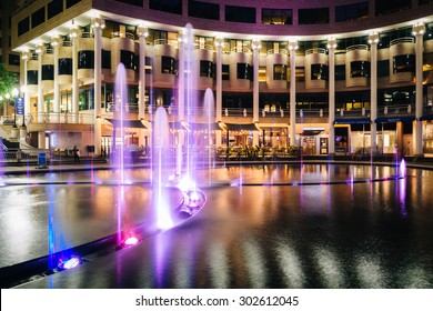 Fountains And Buildings At Night, In Georgetown, Washington, DC.