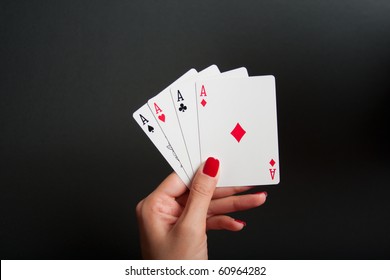 Four Aces in Woman's Hand