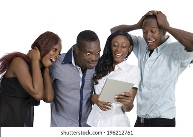 Four African Young People With Tablet PC Having Fun, Studio Shot, Isolated