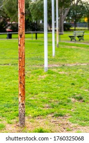 Four Australian Football Goal Posts, One That Is Very Rusted, At A Suburban Football Oval In Brunswick East ,Melbourne, Australia