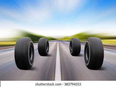 four automobile wheels rush on the road with high speed
