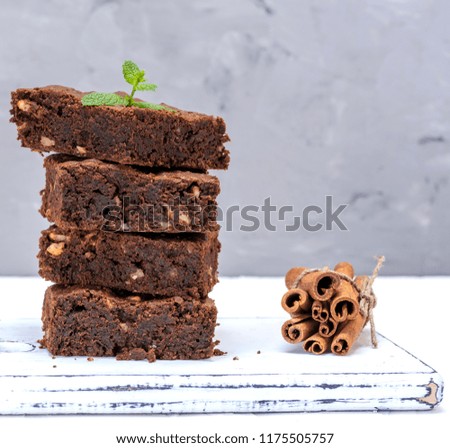 Similar – quadratische Stücke Schokoladenbrownie