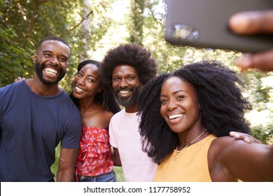 Four Black Adult Friends Take A Selfie During A Forest Hike