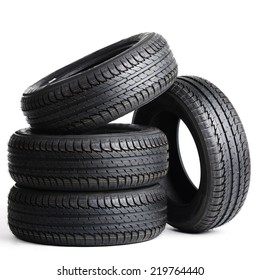 Four Black Tires Isolated On White Background