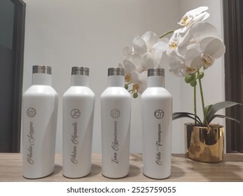 Four bottles, four elements, represents 4 humans with 4 different personalities

they are put into one team, which makes them have to synchronize and harmonize