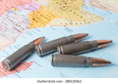 Four Bullets On The Geographical Map Of Tanzania, Kenya, Ethiopia And Somalia In East Africa. Conceptual Image For War, Conflict, Violence.