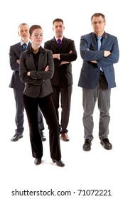 Four business people, one young woman and three older men, with arms crossed over white background