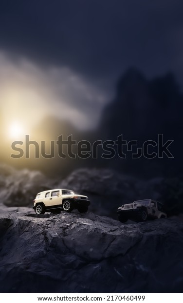 Four by four off\
road car   on mountain road, Travel and racing concept for four\
wheel drive off road\
vehicle.