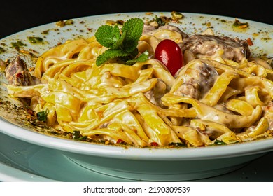 Four Cheese Pasta With Filet Mignon Escalope.