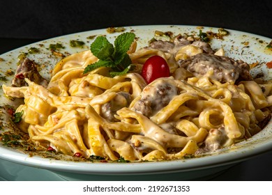 Four Cheese Pasta With Filet Mignon Escalope.