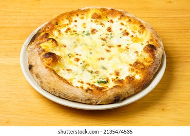 Four Cheese Personal Pizza On A Plate