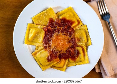 Four Cheese Ravioli  Top With  Pasta Sauce  A Nd Melted Cheese