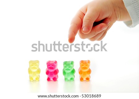 Four of colorfoul gummy bears on white background