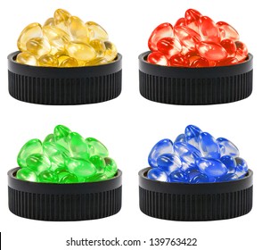 Four Colors Of Liquid Soft Gels In The Black Container. It Can Be Referred To Drug, Cure, Vitamin Or Poison.