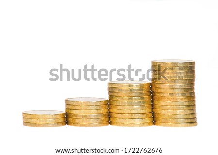 Four Columns of Golden Coins on White Background. Money Growth Concept.