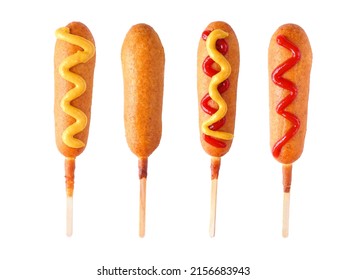 Four corn dogs with different toppings isolated on a white background - Shutterstock ID 2156683943