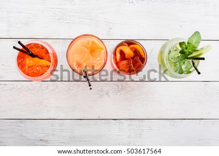 Similar – Image, Stock Photo Transparent pink alcohol cocktail, vodka gin-tonic