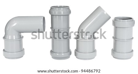 four different PVC fittings - draining straight and elbow pipes