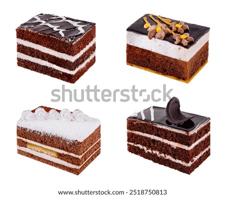 Four different rectangular slices of delicious cake are sitting on a white background