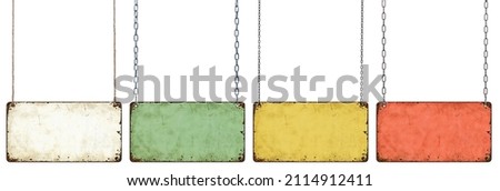 Four empty vintage tin signs hanging on a white background