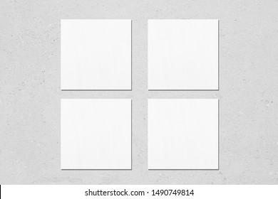 Four Empty White Square Business Card Mockups With Soft Shadows On Neutral Light Grey Concrete Background. Flat Lay, Top View