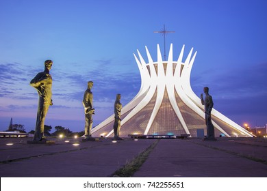 The Four Evangelists Sculpture By Alfredo Ceschiatti In Front Of Cathedral In Brasília, Brazil, During Sunrise.