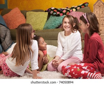 Four Excited Little Girls Together For A Sleepover Party