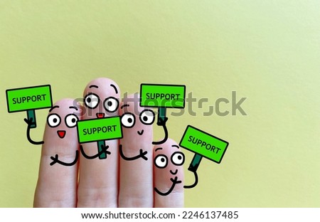 Four fingers are decorated as four person. All of them supporting the movement.