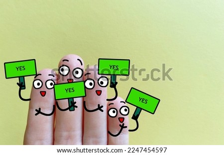 Four fingers are decorated as four person. All of them say yes.