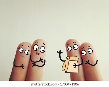 Four Fingers Are Decorated As Four Person. Two Of Them Receive A Food Parcel From Another Two Person.