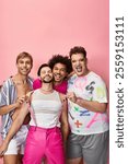 Four friends showcase their vibrant styles and joyful spirit, celebrating queer pride together.